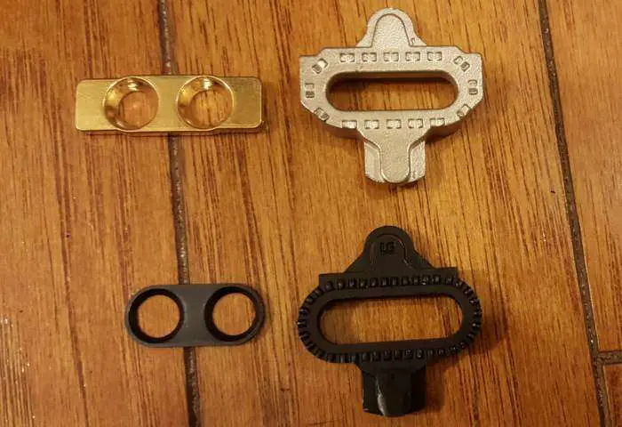 Top: Xpedo CXR Cleat, Bottom: Shimano SH51 Cleat.