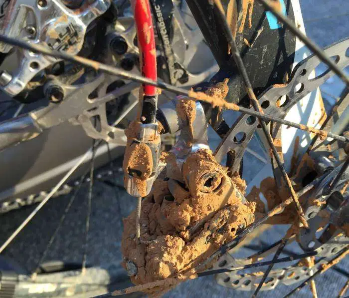 Disc brake caliper after mudhole dousing.