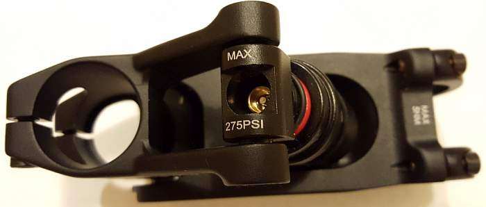 The Schrader valve adjusts the shock pressure.