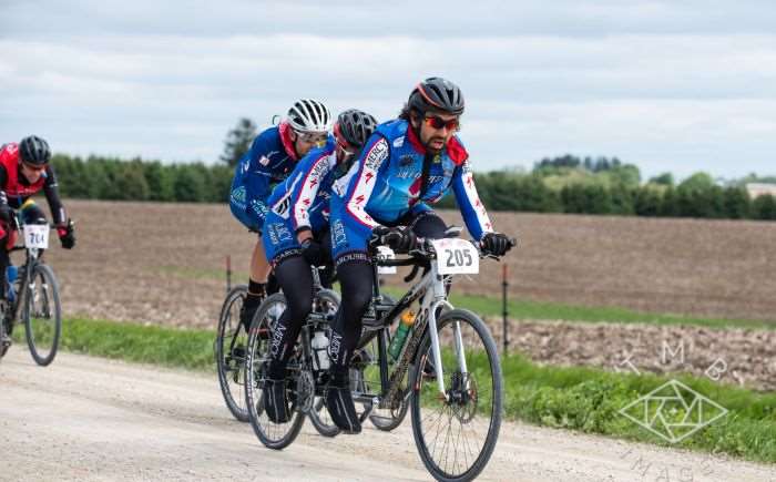 Photo by TMB Images. Tandem with the hammer down, Charlie at left struggling.