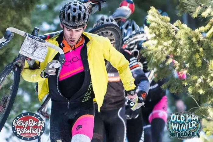 Ryan Petry dismounts and carries his bike through the Rowena Trail in 2016. Photo by Dejan Smaic.