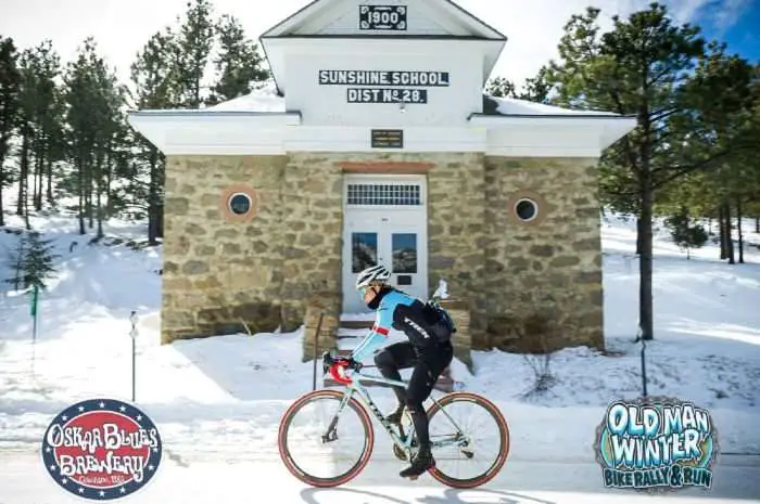 Katie Compton begins the steep and windy descent down Sunshine Canyon where the course enters the City of Boulder. Photo by Dejan Smaic.